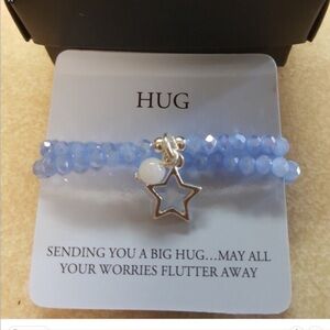 Avon Spring wishes  HUG bracelet new in box 
New in box from Avon